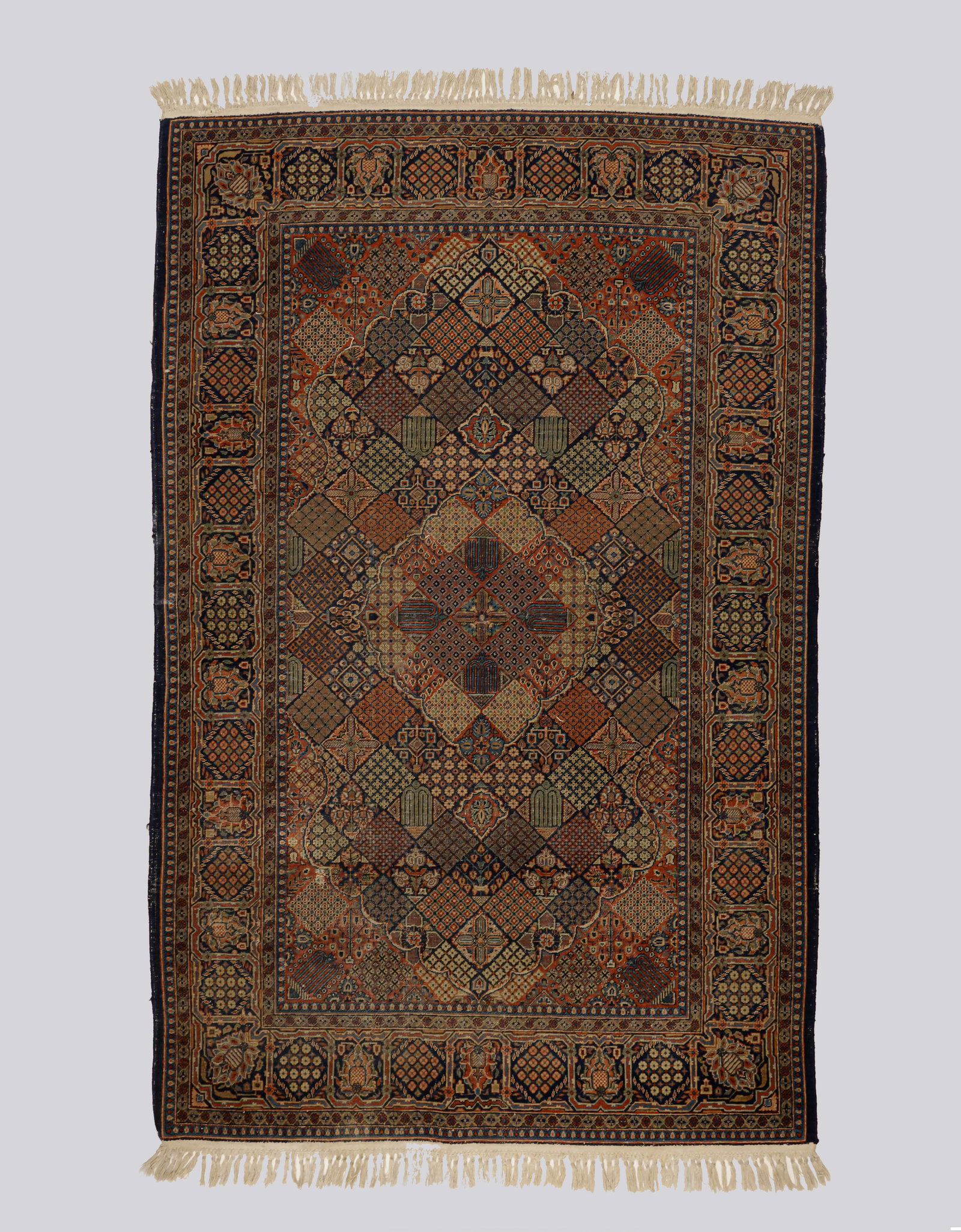 Persian Rug: Persian rug, decorated with floral and geometric motifs. Dimensions (without strands): 202X132 cm. Minor wear.