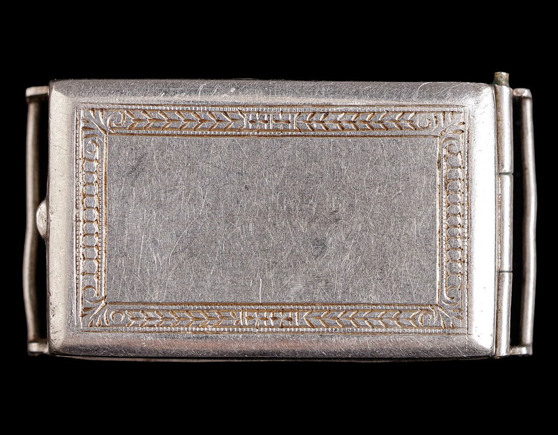 Lady’s Platinum Watch Case: Lady’s watch case made of platinum. Dimensions: 26X16 mm. Weight: 5.7 grams. Hallmarked.