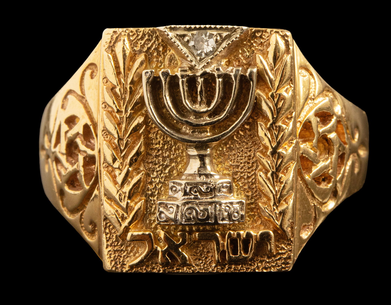 Gold Diamond Ring: 14K gold Man's ring , decorated with the emblem of Israel, set with a diamond weighing about 2.5 points. Size: US 7.5, Total Weight: 9 g. Hallmarked.