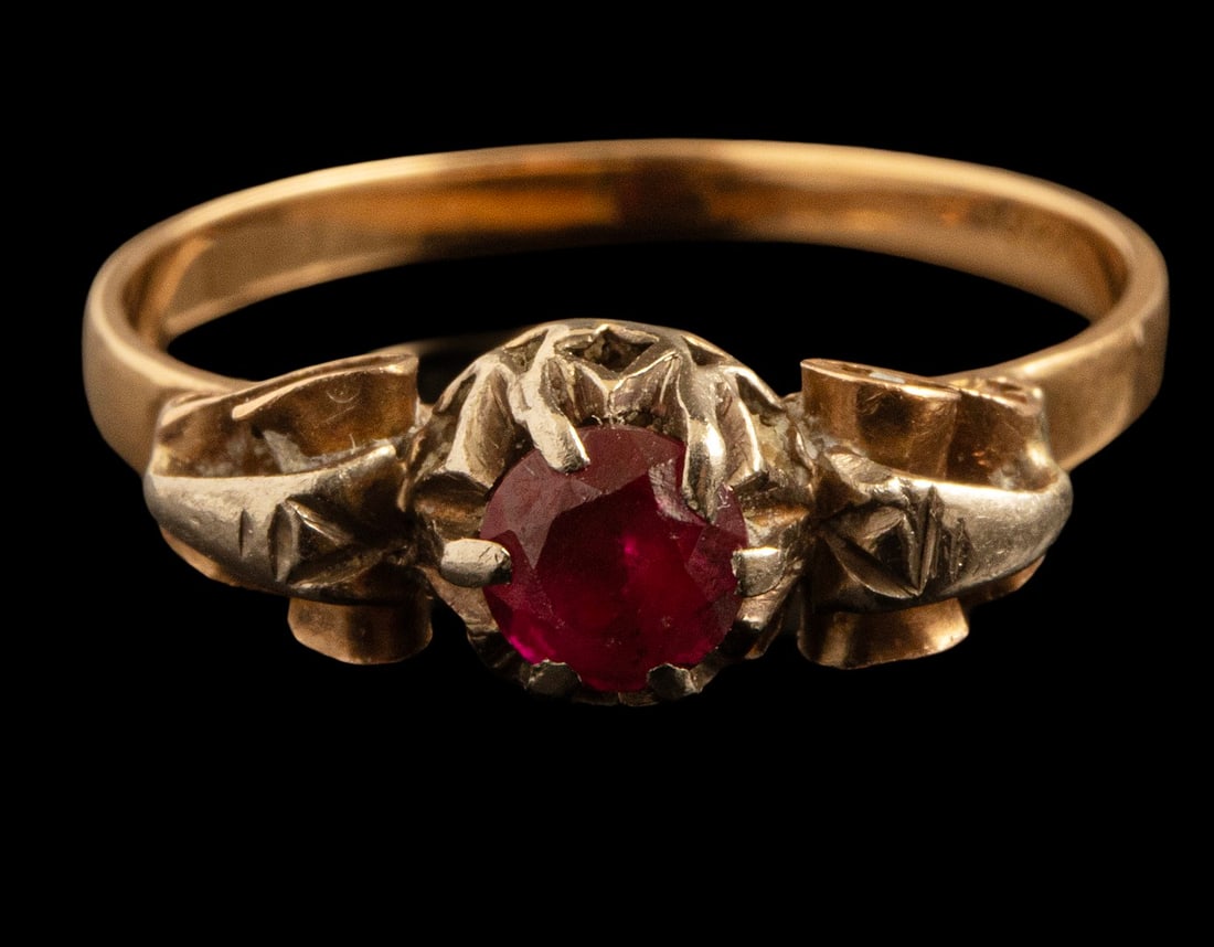 Gold Ruby Ring: 18K gold ring set with a 4 mm diameter ruby. Size: 6 US, Weight: 2.1 grams. Hallmarked.