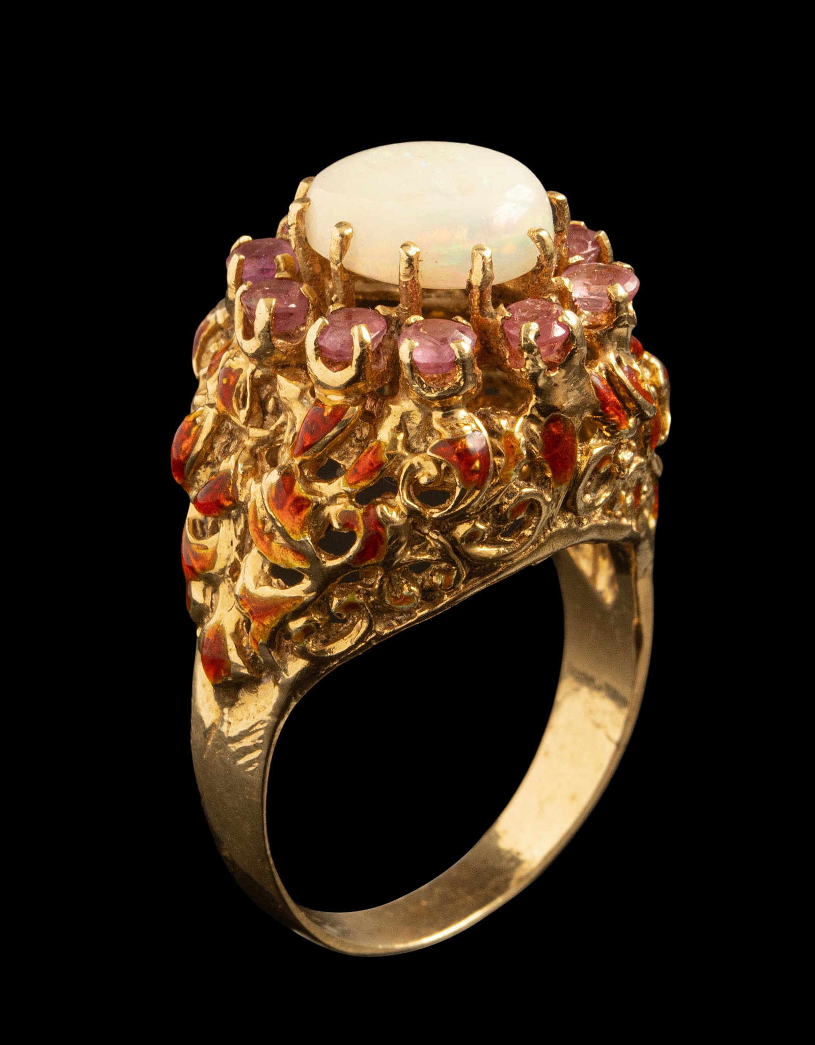 Enameled Gold Opal ring: Enameled 14K gold ring, set with opal (10X8 mm) and purple gemstones. Size: US 7, Total Weight: 8.1 g. Hallmarked.