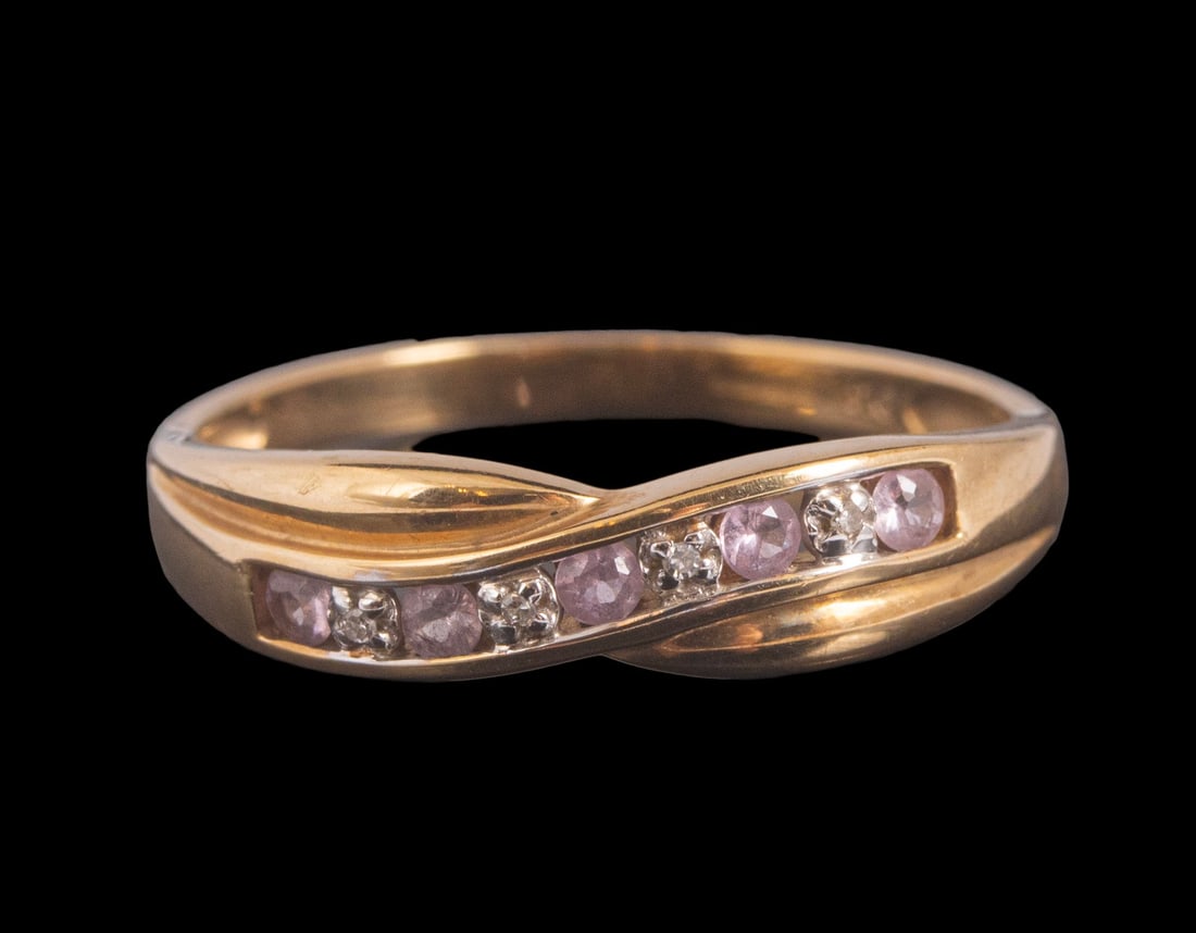 Gold Spinel Diamond Ring: English 9K gold ring, set with 4 diamonds weighing about 1 point each and pink spinels. Size: 9.5 US, Weight: 2.5 grams. Hallmarked.