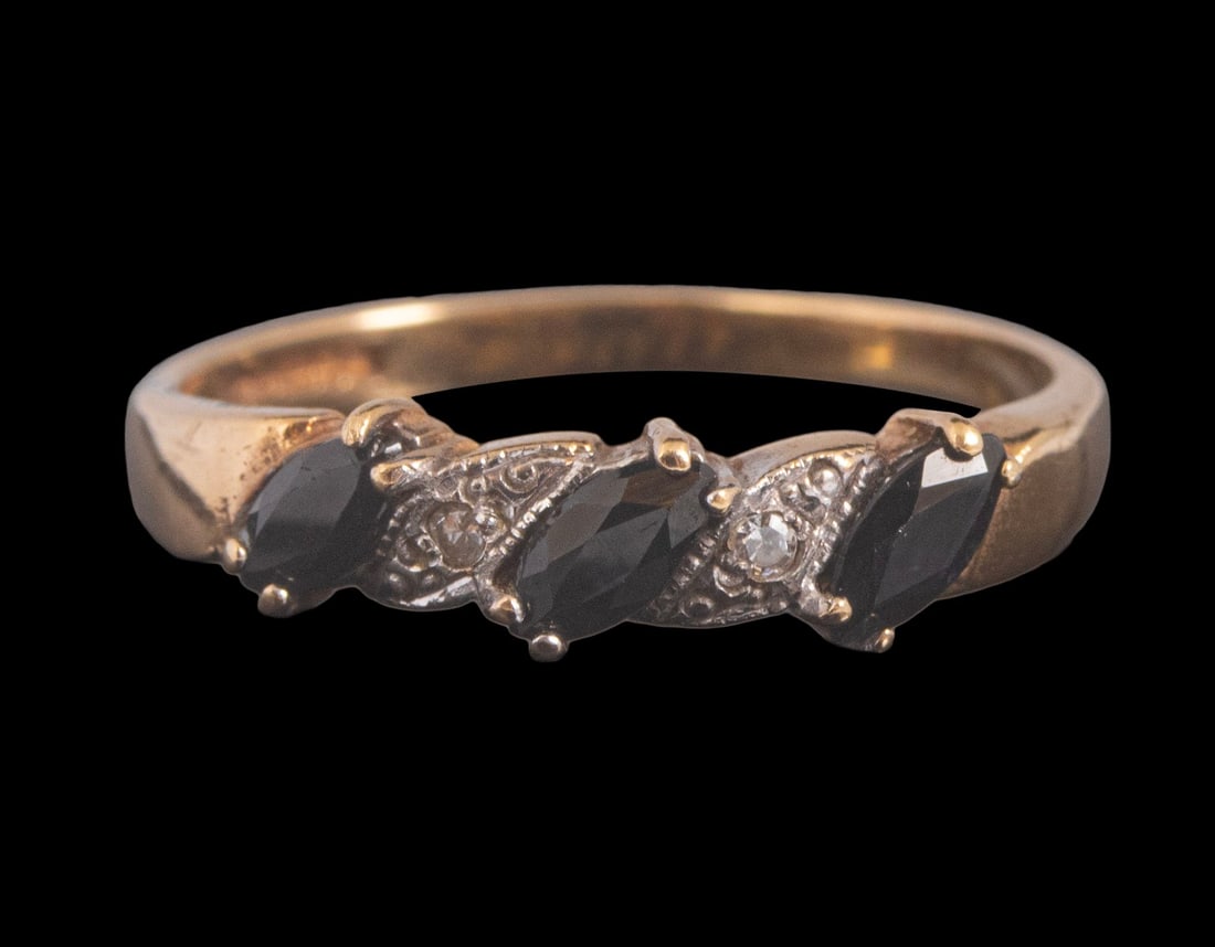 Gold Spinel Diamond Ring: English 9K gold ring, set with 2 diamonds weighing about 1 point each and a spinel. Size: US 5 3/4, Weight: 1.6 grams. Hallmarked.