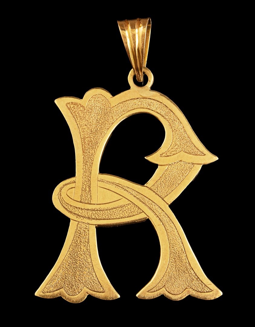 Gold Pendant: 14K gold pendant in the shape of the letter R. Length: 4.5 mm, Weight: 3.6 grams. Hallmarked.