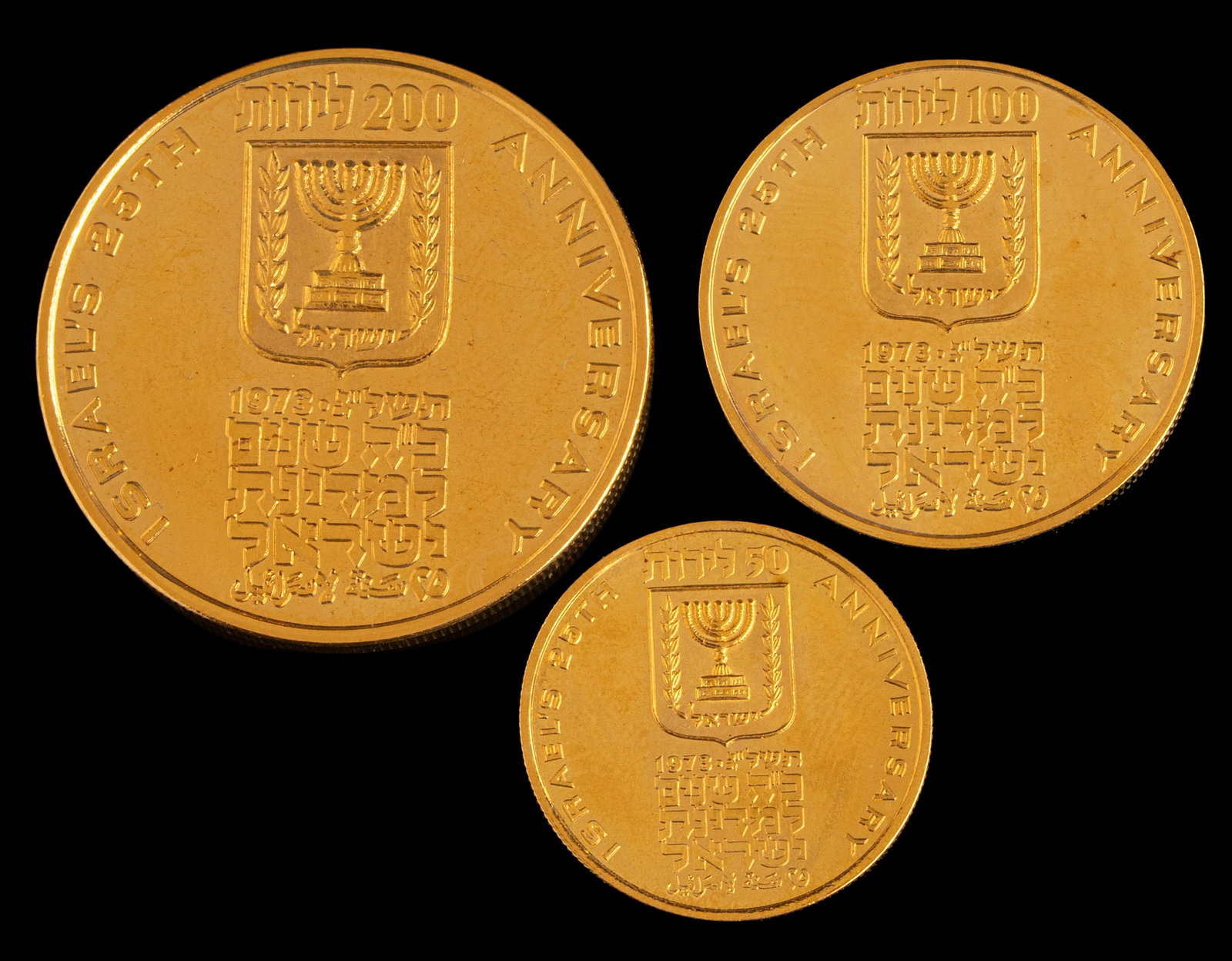 Israeli Gold Coins: Set of three 900 gold coins, 25th Anniversary of the State of Israel, by the Israeli Government Company, 1973. Diameter: 22, 27 and 33 mm. Total weight: 47.5 grams. In the original wooden box.