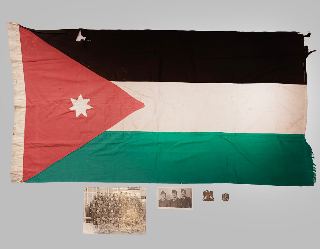 Jordanian, Egyptian, & Syrian items, War Trophies: Lot of 5 Jordanian, Egyptian, and Syrian items taken as war trophies, 1950's–1970's, including: a Royal Jordanian Army flag, two Egyptian brass emblems depicting the Eagle of Saladin, a