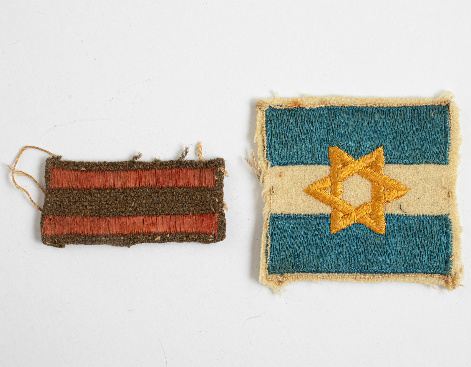 Badges, The Jewish Brigade: Lot of two fabric badges, the Jewish Brigade. Length: 5.5 cm.
