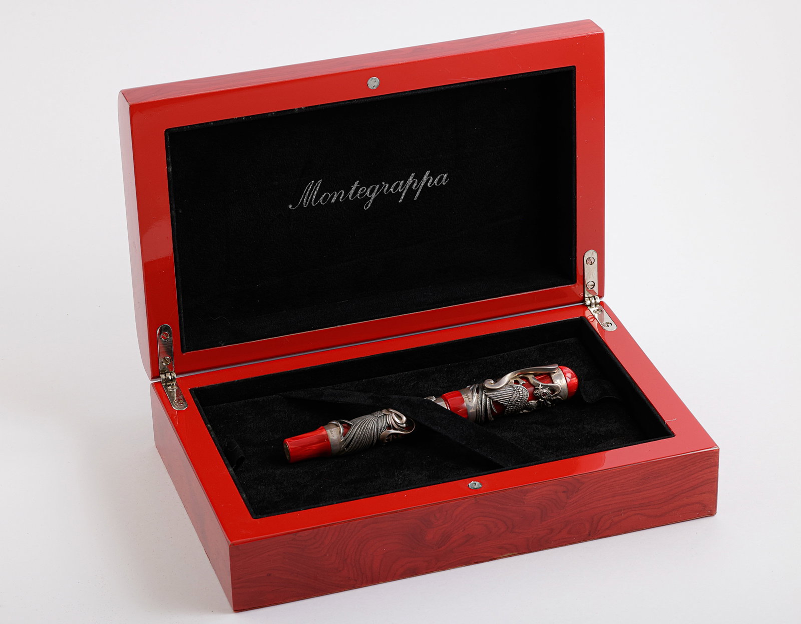 Montegrappa Eternal Bird Fountain Pen, Limited Edition: Montegrappa Eternal Bird fountain pen, Red celluloid with sterling silver overlay, Limited Edition. Size: 5.65" (14.4 cm). 2 toned 18K white gold nib, M. Numbered 1477/1912. Excellent condition, in or