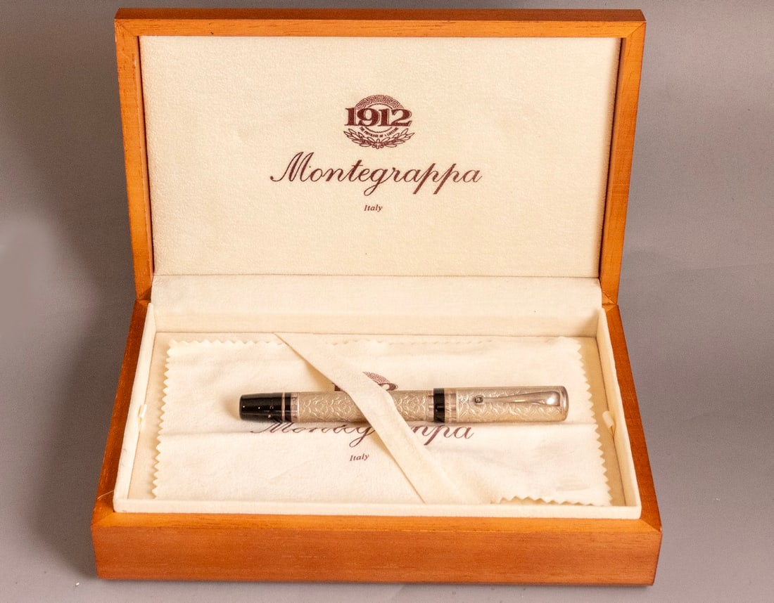 Montegrappa Cosmopolitan Batik Fountain Pen, Limited Edition: Montegrappa Cosmopolitan Batik, Limited Edition Fountain Pen, Sterling silver overlay, numbered 112 out of 500, Size: 5.45" (13.8 cm), 18K gold nib, M, excellent condition, in original box with certif