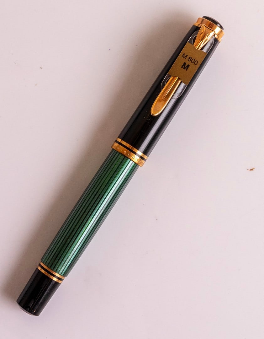 Pelikan M800 Fountain Pen: Pelikan M800 fountain pen, West Germany, Green striped with GP trims. Size: 5.55" (14.1 cm). 2 toned 18K gold nib, M. NM condition, NOS.