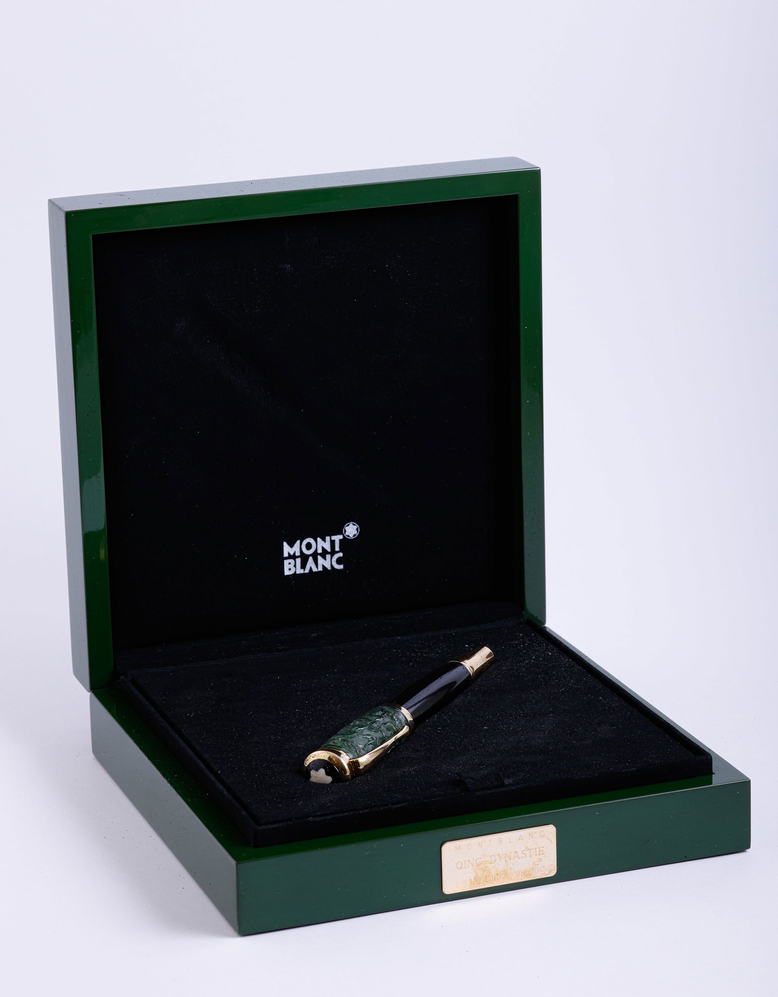 Montblanc Qing Dynasty Limited Edition Fountain Pen: Montblanc Qing Dynasty Limited edition fountain pen, Black with carved jade cap. Size: 5.4" (13.7 cm). 18K gold nib, M. Numbered 1983/2002. Very good condition in original box. Never inked.