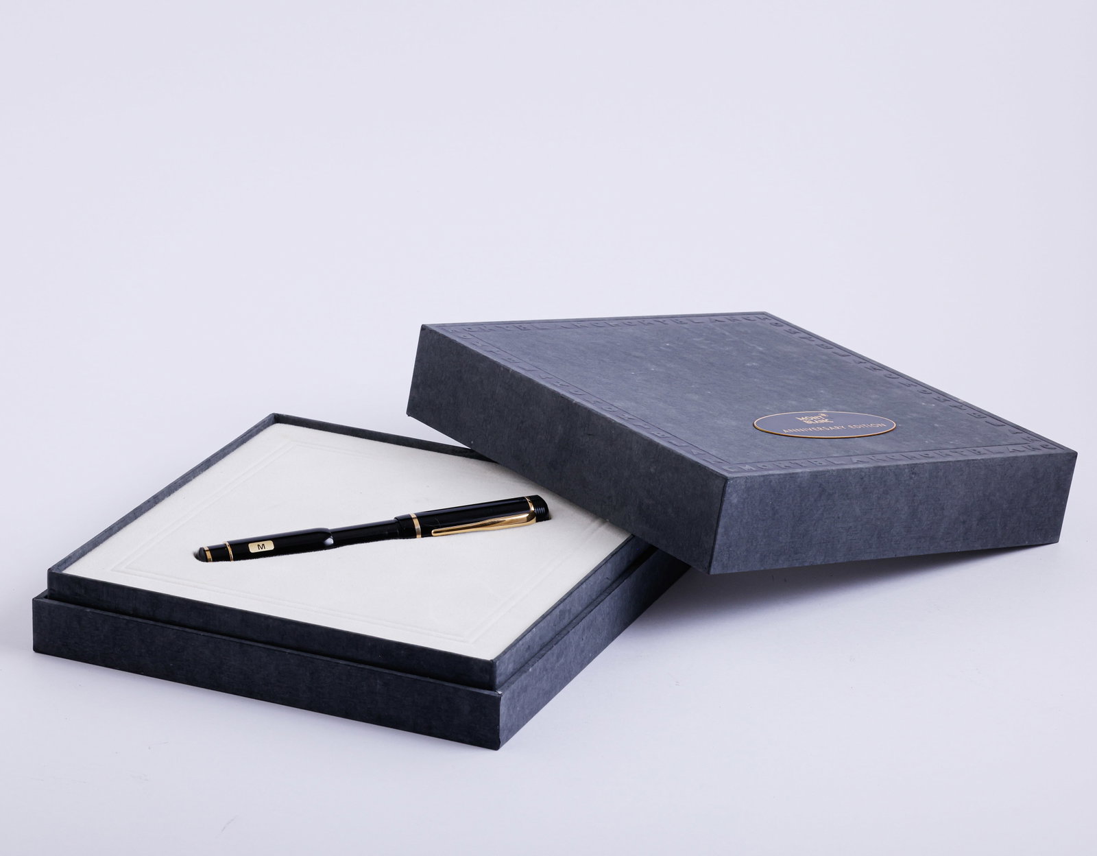 Montblanc 100 Years Anniversary Fountain Pen, Limited Edition: Montblanc limited edition fountain pen, 100 Years Anniversary, Black. Size: 5.1" (13 cm). 18K gold nib, M. Numbered 9764/15000. Mint in original box, accompanied by the brochure. Never inked.