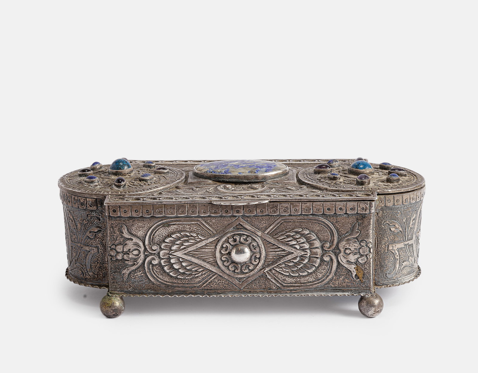 Silver Box, Germany: 800 silver box by Hestermann & Ernst, Germany, Munich. Set with various stones and decorated with floral motifs. Dimensions: 17.5X6X9 cm. Weight: 360 grams. Hallmarked.