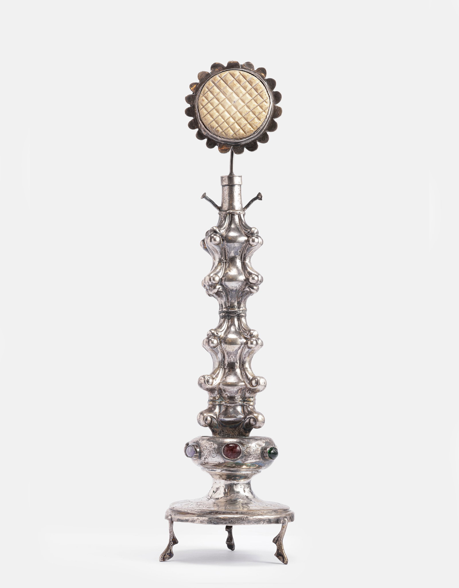 Silver & Carving Judaica Ritual Object: Judaica - Improvised silver Judaica ritual object, the upper section carved and shaped as a flower. Set with stones and decorated with a Hebrew inscription. Stands on 3 legs. Height: 30 cm. Total