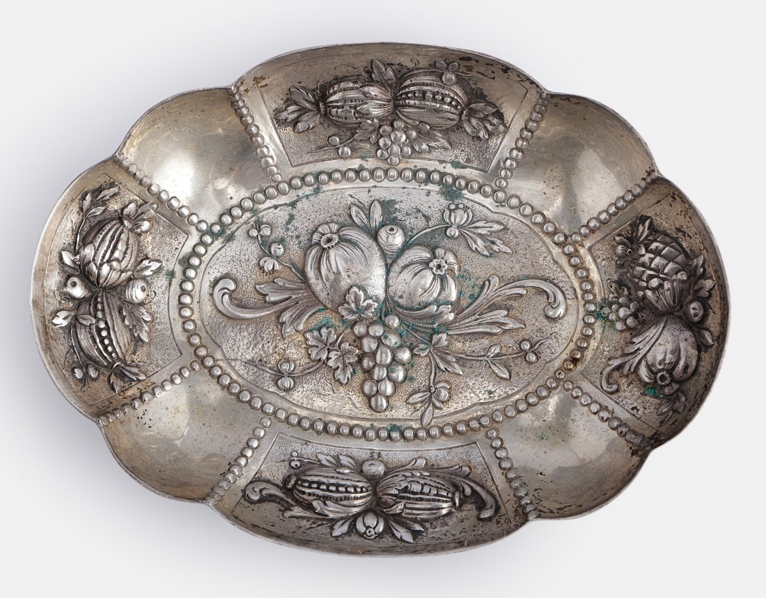 German Silver Bowl: German 13 silver bowl. Embossed with fruit motifs. Dimensions: 17.5X13 cm. Weight: 159 grams. Hallmarked.