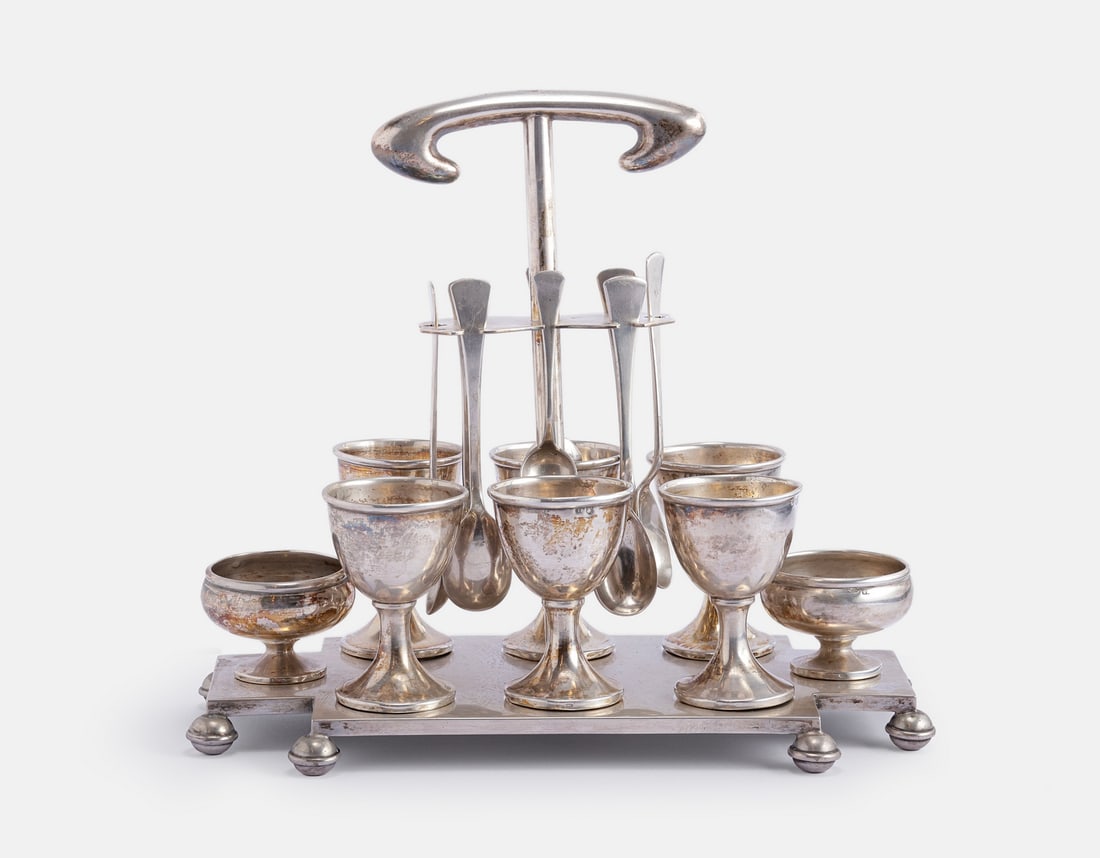 Austro-Hungary Silver Soft-Boiled Egg Serving Set: Silver soft-boiled egg serving set by Hermann Sudfeld, Vienna, Austro-Hungary. Set for six, including spoons and egg cups, as well as salt and pepper containers with spoons. Height: 21 cm. Length: 23