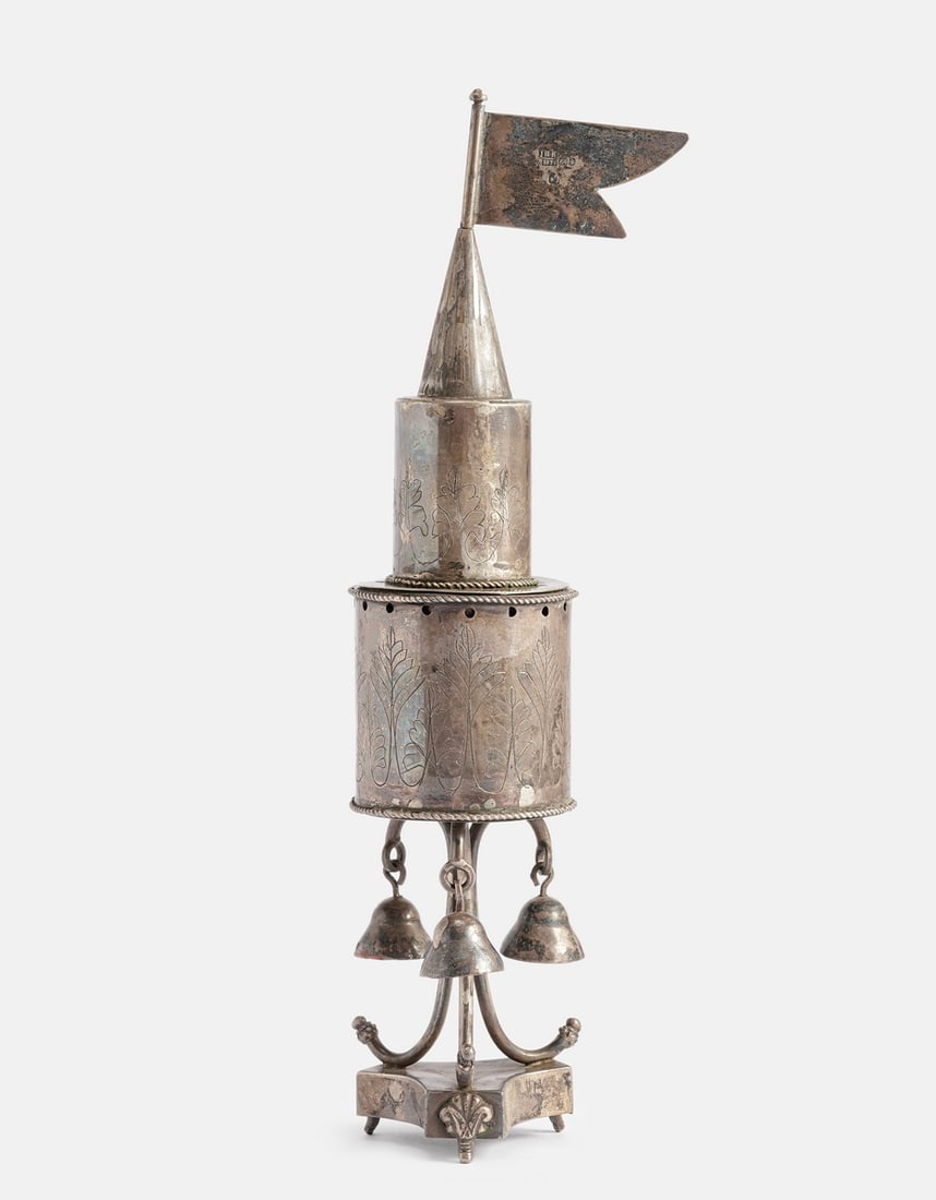 Silver Spice Tower (Besamim): Silver spice tower (Besamim). Engraved with floral motifs, bells, and a flag. Height: 24 cm. Weight: 156 grams. In a wooden box. Bears Russian marks.