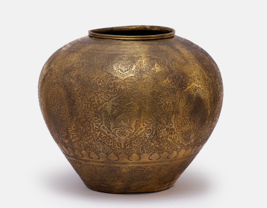 Large Persian Brass Vase: Large Persian brass vase, engraved floral motifs. Height: 36 cm. Max. diameter: approx. 64 cm.