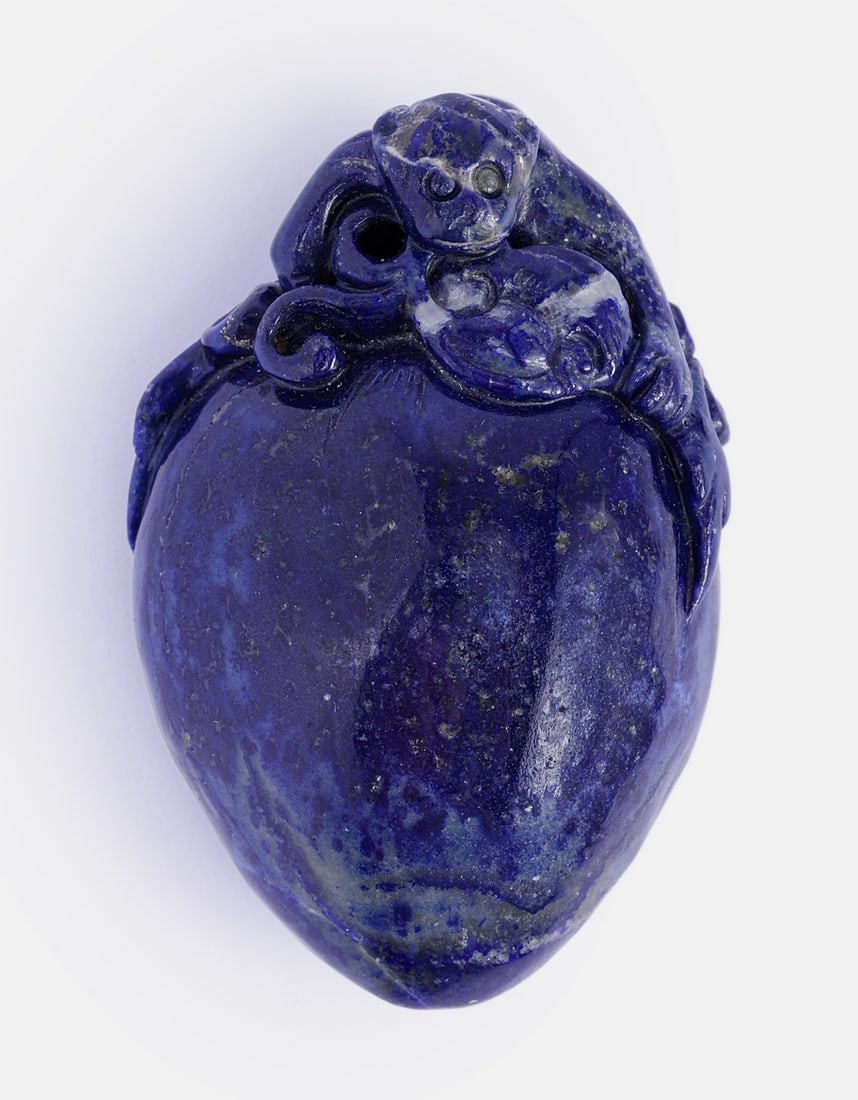 Chinese Lapis Lazuli Figurine: Chinese Lapis Lazuli figurine, late Qing dynasty. Carved in the form of a monkey sitting on a gourd. Length: 6.5 cm.