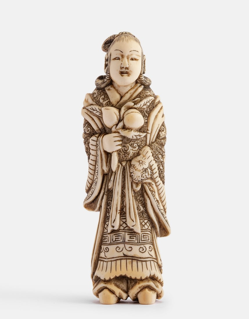 Carved Japanese Netsuke: Japanese netsuke, Meiji period. Carved in the form of a geisha. Height: 9.5 cm.