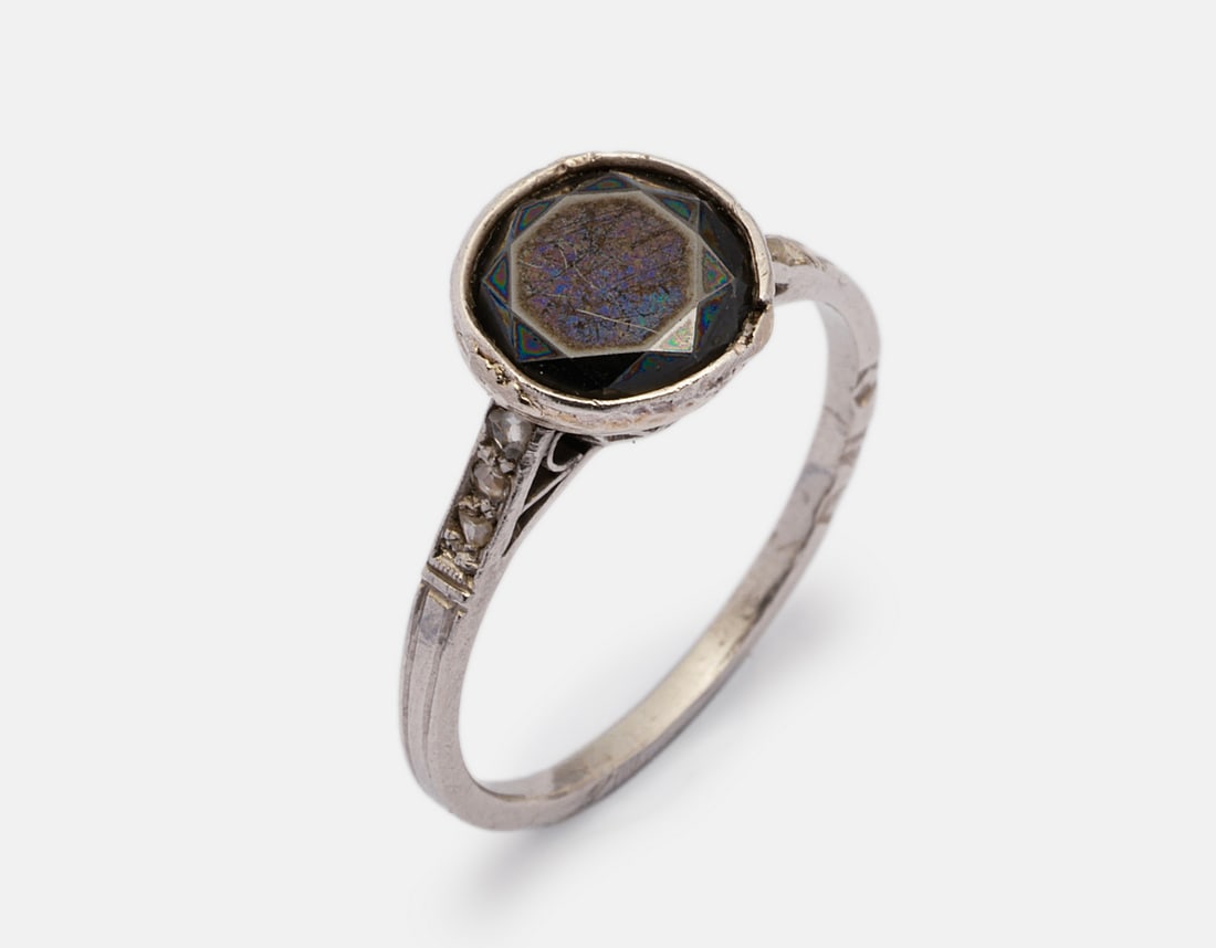 Platinum & Diamond Ring: A platinum ring set with a black diamond weighing 1.9 carats. Size: 6.5 US, Weight: 3.2 g. Hallmarked.