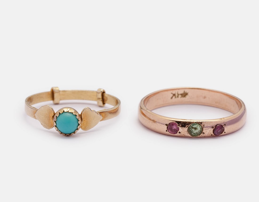 Gold Rings: Lot of 2 14K gold rings, set with turquoise, emerald, and ruby. Sizes: 4-6 US. Total weight: 2.8 grams. Hallmarked.