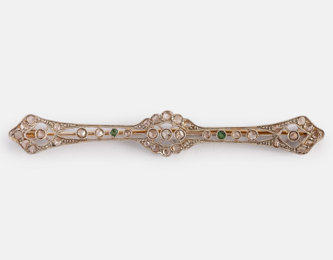 Gold, Emerald & Rose-cut Diamond Brooch: 18K Art Deco gold brooch set with emerald and Roses. Length: 70 mm. Weight: 5.8 g. Unmarked, gold tested.