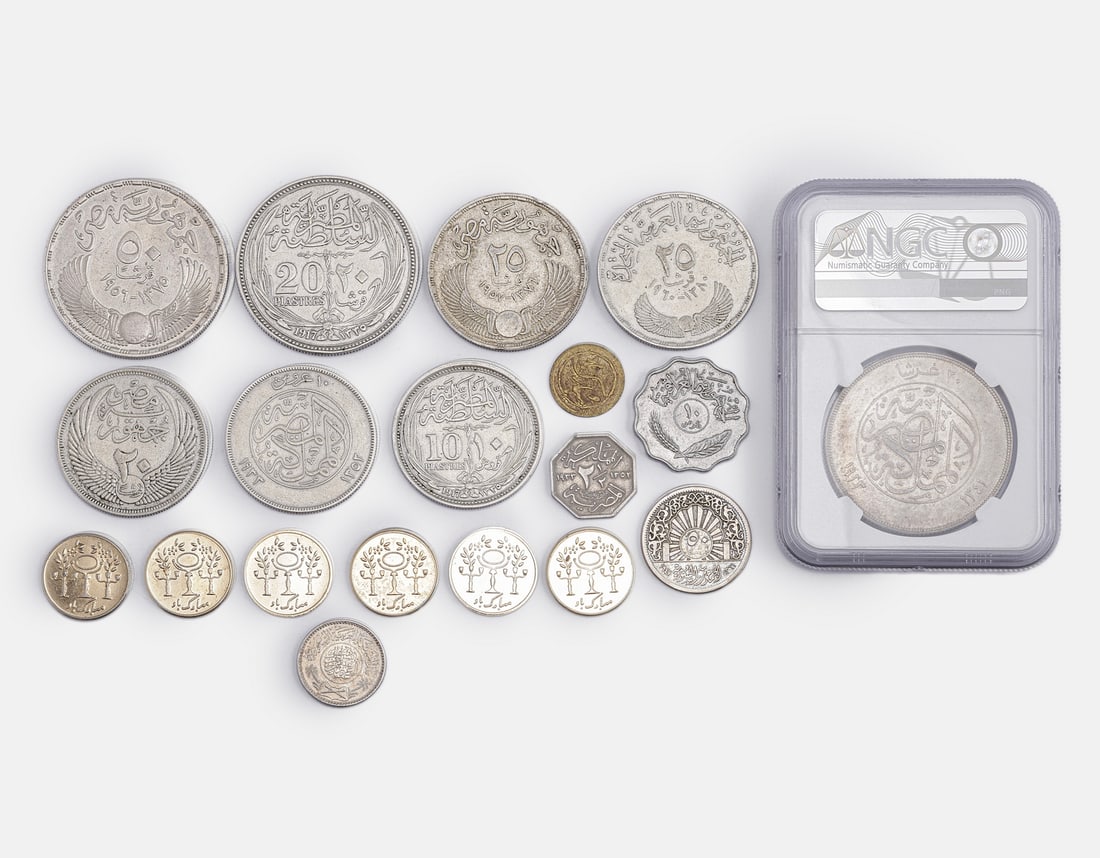 Silver & Metal Coins, Arab World: Lot of 19 silver and metal coins, Arab world including Egypt and Saudi Arabia. Comprising six 720 silver coins (total weight: 117.5 grams), one 917 silver coin (weight: 2.9 grams), one 833 silver coin