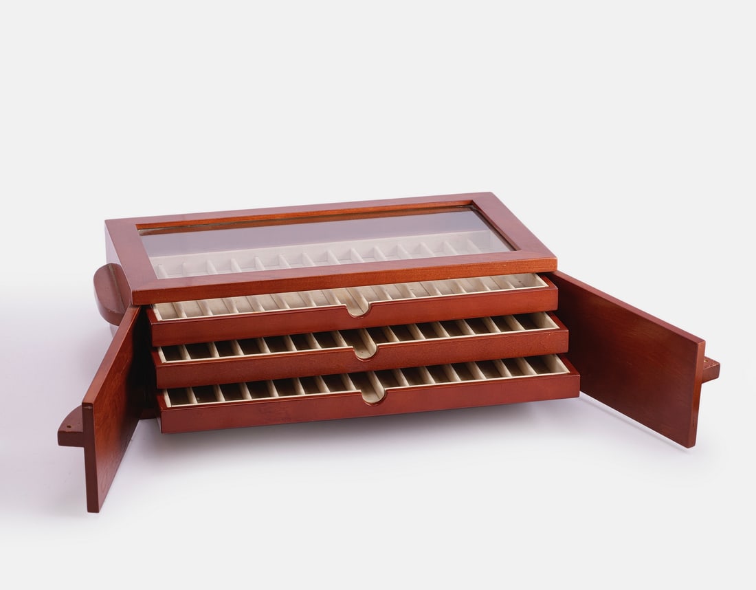 Pens Display Cabinet: Pens storage and display case, made of wood. Dimensions: 21X12.5X42 cm. The cabinet holds 45 pens. Minor stains on the inner velvet lining.