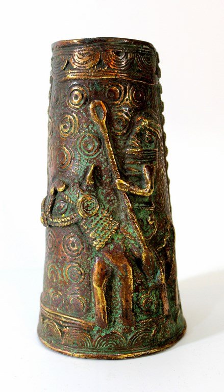 African tribal bracelet: An African tribal bracelet made of bronze, probably from Benin. Decorated with a relief of a man riding a donkey. Length: 19 cm.