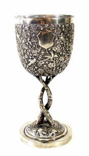 19th century Chinese Export silver goblet: A 19th century Chinese Export silver goblet, embossed with reliefs of flowers and birds. The leg is designed as two tree stems. With an inner silver liner. Height: 19 cm. Weight: 274 grams, Signed: Hu