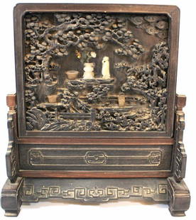 Chinese wooden screen: A Chinese wooden screen, set with jade and other gemstones. Carved with scenes from a Chinese garden. Total height: 33 cm. Minor flaws.