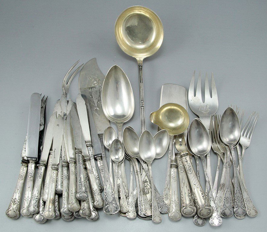 Russian silver cutlery set: A Russian 84 silver cutlery set by Mikhail Grachev, St, Petersburg, C.1910. Total weighable silver: over 2200 grams. Signed, bears a monogram.