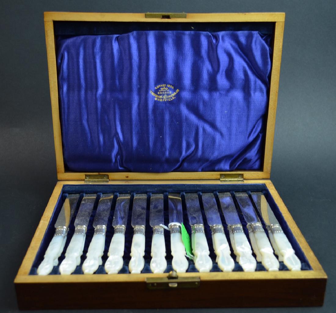 English Antique Pearl Handled Set Sheiffield: 12 knives and 12 forks.