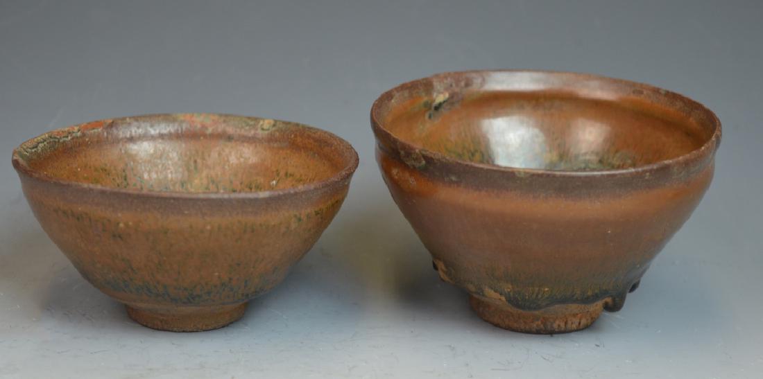 Lot of 2 Chinese Jian Hare's Fur Pottery Bowls: The taller bowl si 2 3/4 inches x 4 5/8 inches. The shorter bowl si 2 1/8 inches x 4 1/4 inches.