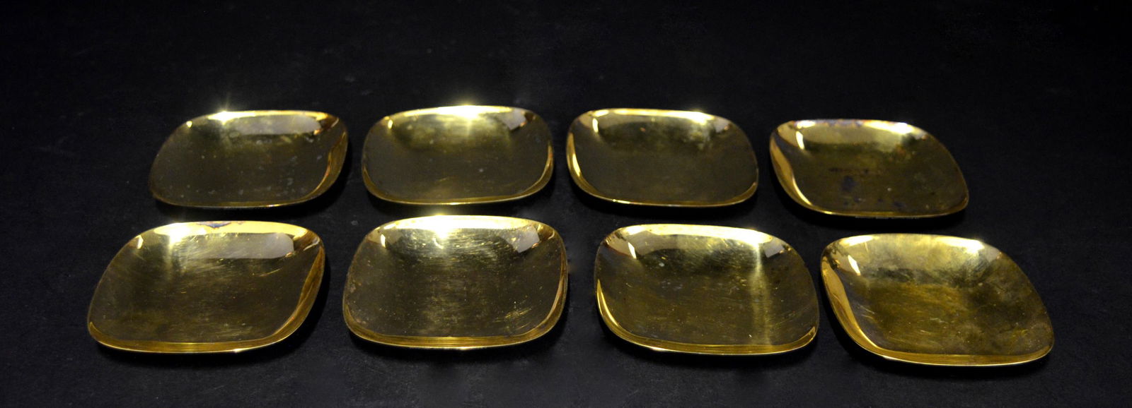 A Set of 8 Tiffany & Co. Silver Gilt Coasters: A Set of 8 Tiffany Silver Gilt Coasters. Marked Tiffany & Co. Makers, sterling. 3 1/2" x 3 1/2" 16.59 troy oz.