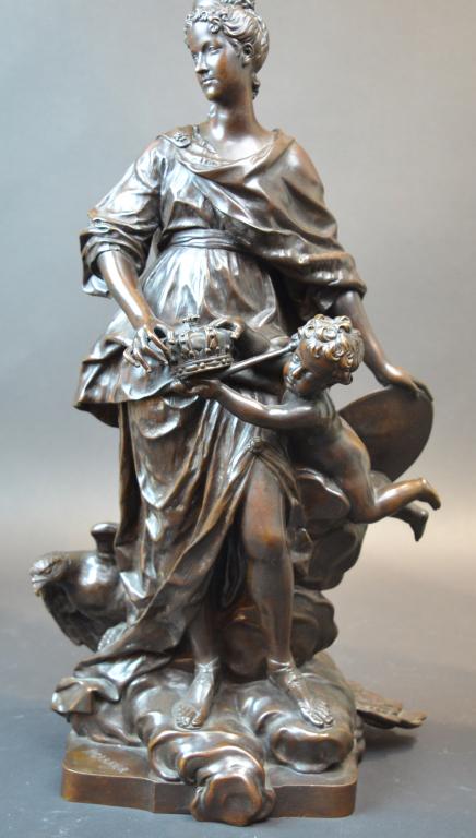 Carrier Bellouse bronze statue cast by Barbedienne: A Carrier Bellouse bronze statue cast by Ferdinand Barbedienne. Very finely cast, dark brown patina. Depicting a queen with cupid coronation. 19th Century France. 19 1/4" high.