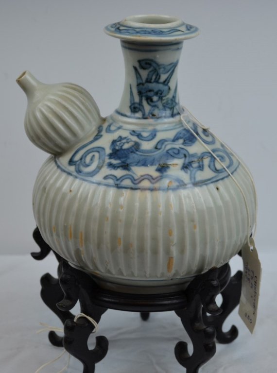 CHRISTIES CHINESE B&W PITCHER MING DYNASTY: Ming Dynasty. Rare Chinese blue and white pitcher with foo dog and floral in blue glazed design.7" H