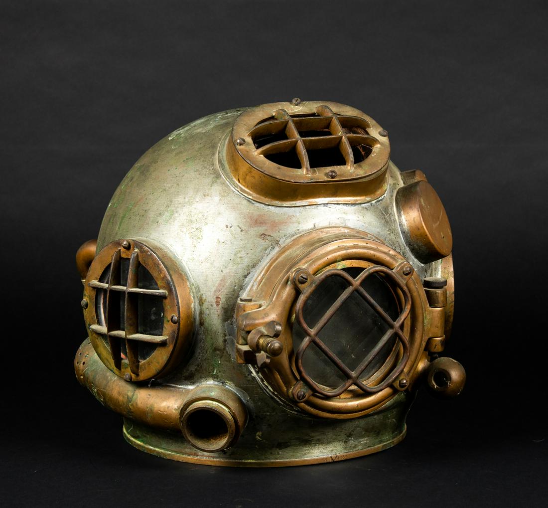 Bronze and Steel Diving Helmet: Bronze and Steel Diving Helmet, Approximately 12" sphere made of steel with a tin wash, bronze fittings, unmarked, some dents but appears functional, 20thC. Estimate: $100 - $200