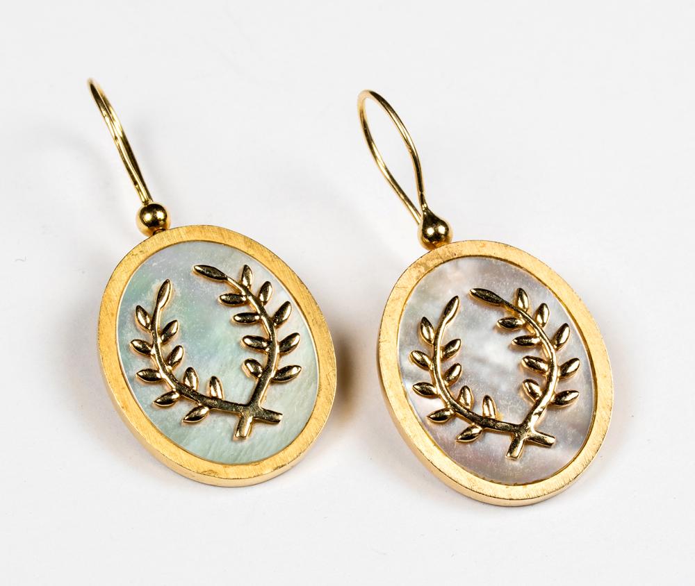Suzanne Wilson 14K and Mother of Pearl Earrings: Suzanne Wilson 14K and Mother of Pearl Earrings, Designer made and marked "SWD 14K" dramatic drop earrings with center set mother of pearl with gold applied laurel leaves. Bezel is matte finish with p