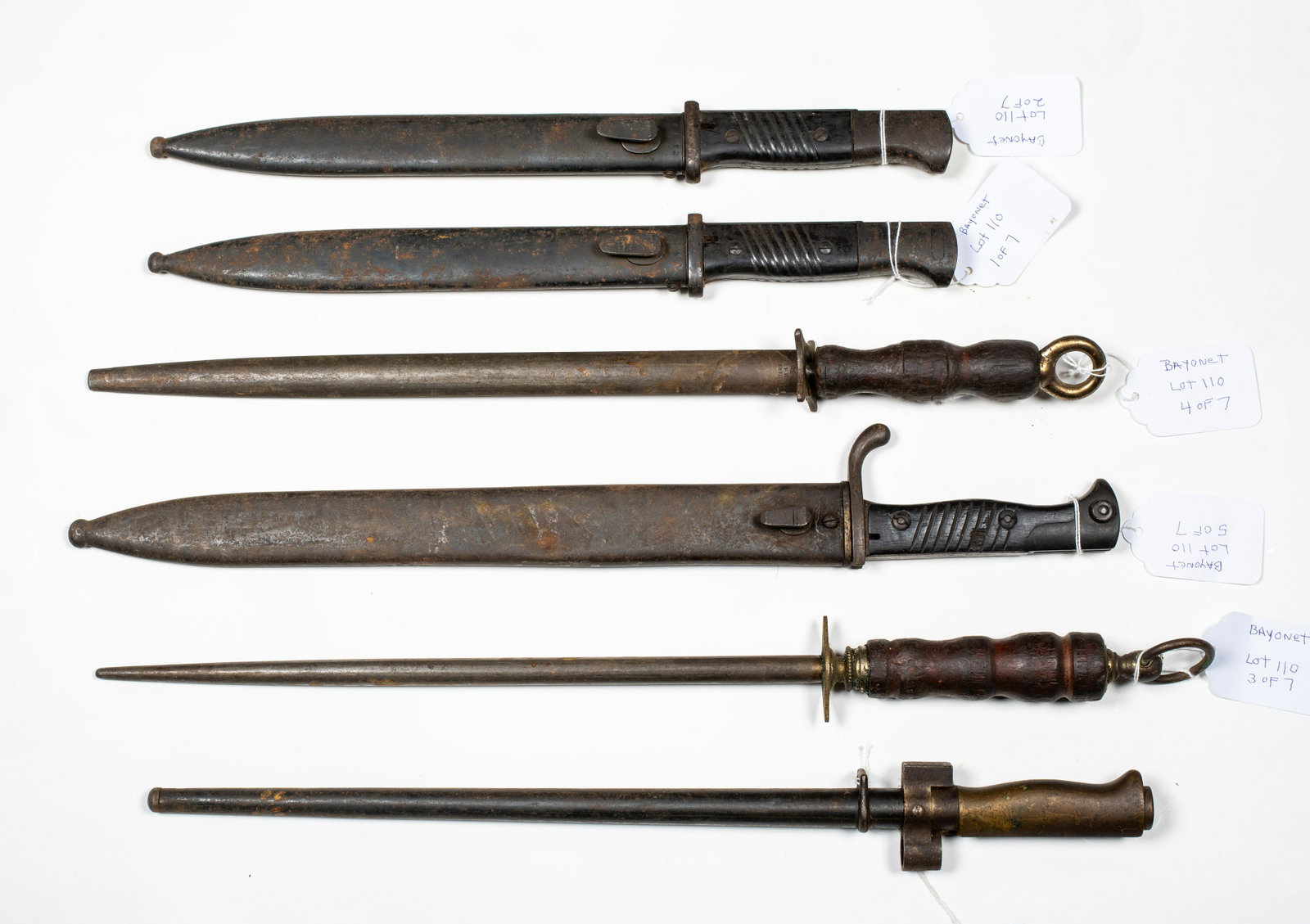 Lot of Six World War I and World War II French and: Lot of Six World War I and World War II French and German Bayonets, Plus a double 19thC American powder horn. Estimate: $100 - $200