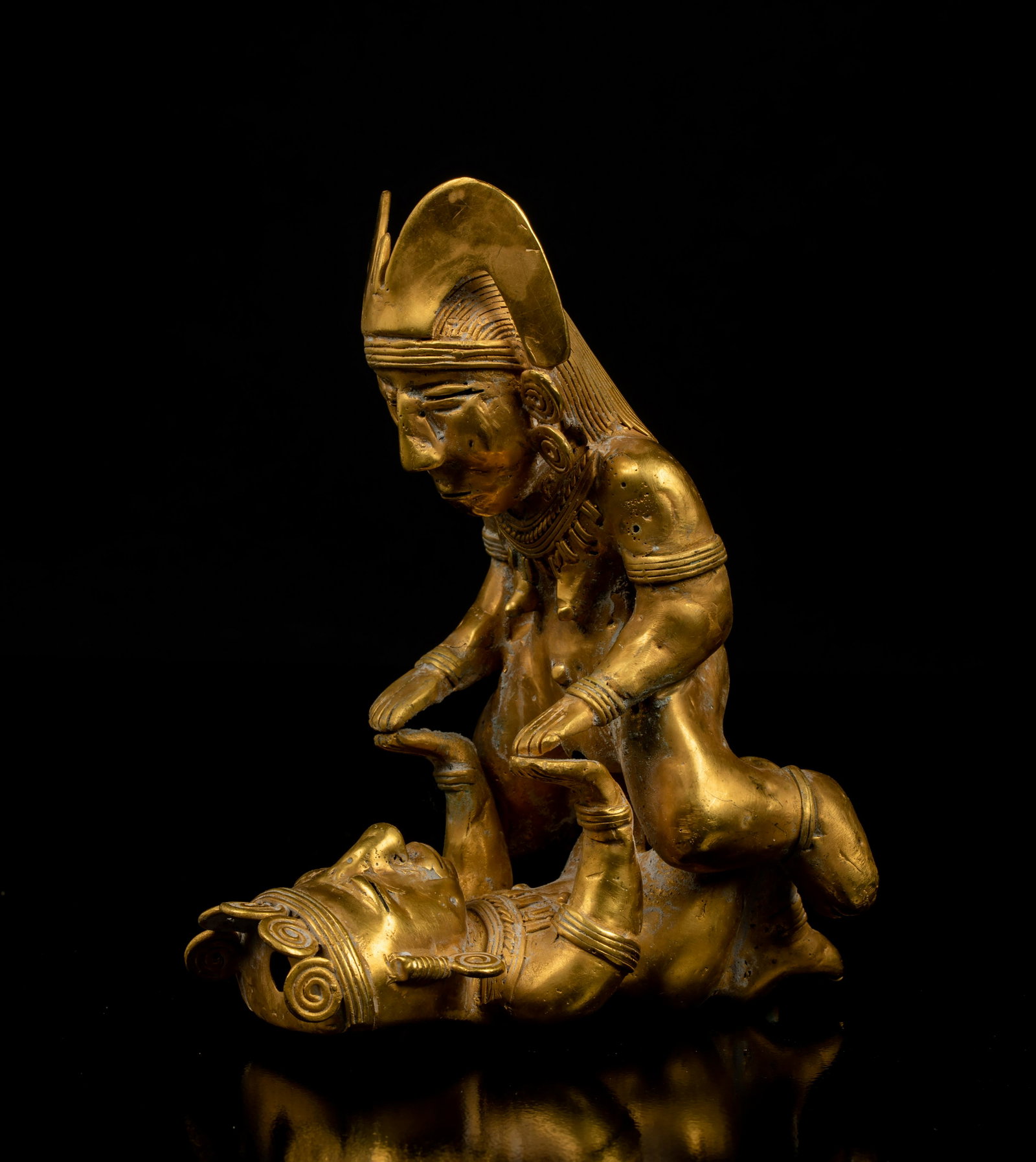 Pre-Columbian Tairona Gold Sexual Couple: Pre-Columbian Tairona Gold Sexual Couple, A 5" wide male and female in a sexual position both with headdress touching hands, 7.8 Toz of of low quality gold. Provenance: NH and Central American collect