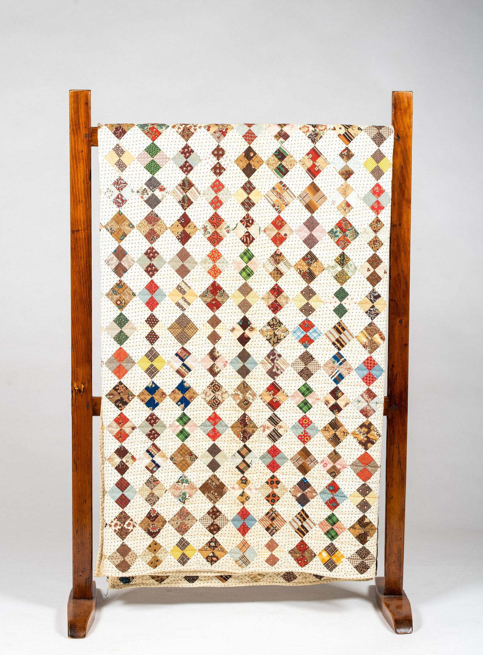 American Signed and Dated 1858 Patchwork Quilt: American Signed and Dated 1858 Patchwork Quilt, Stitched onto one end of the quilt "Mary Ann Lehnrine Walt, 1858", having an all over design of multicolor patchwork diamonds in between cream diamonds 