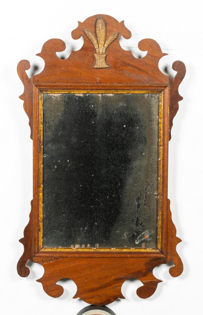 Chippendale Mirror with Prince Wales Feather on Crest: Chippendale Mirror with Prince Wales Feather on Crest, Some damage to ears gold around mirror, 19thC England/ American, 23 3/4" tall. Estimate: $100 - $200