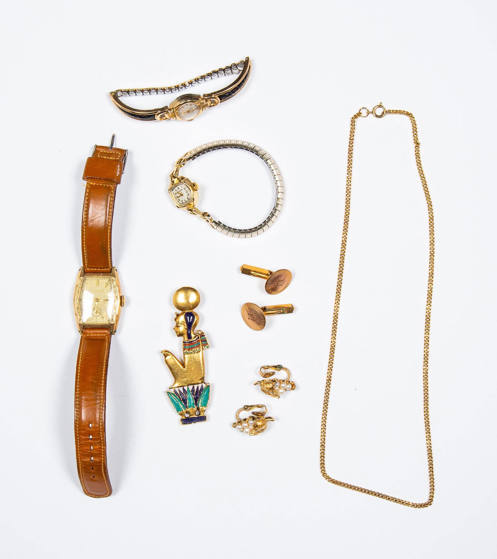 Lot of Watches and Miscellaneous: Lot of Watches and Miscellaneous, Includes: mens 10k rolled gold Bulova watch with leather straps, ladies 14k marked Bulova watch with stretch strap, ladies Gruen watch, a pair of gold plated cufflink