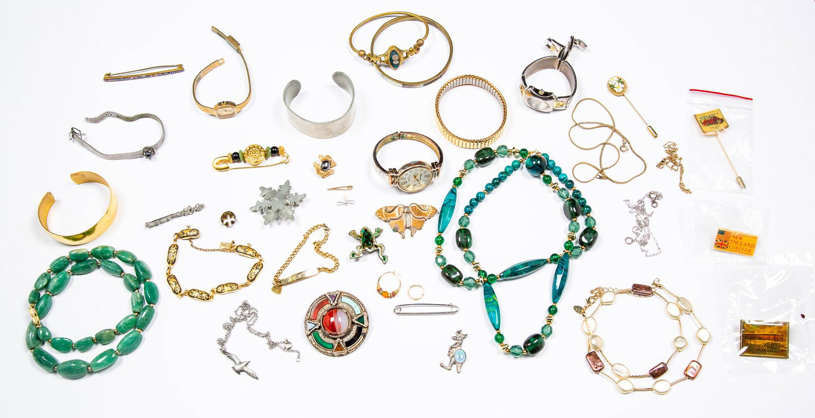 Lot of Various Costume Jewelry Pieces and Music Box: Lot of Various Costume Jewelry Pieces and Music Box, Variety of items including pins, beaded chains, watches and bracelets, comes with a wood inlaid music jewelry box.
