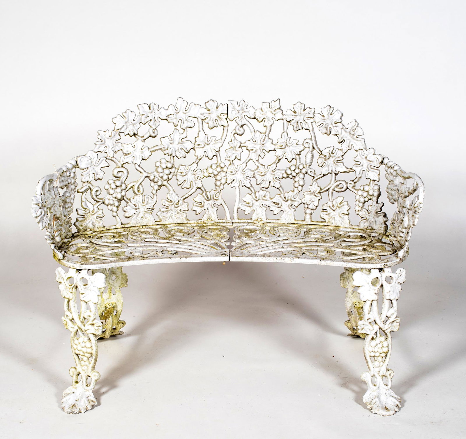 Cast Metal Grapes and Leaves Settee: Cast Metal Grapes and Leaves Settee, Pierce back and arms, in old white paint, maybe aluminum as its lighter weight, good overall, 41" long x 29" tall x 15 1/4" seat height, E20thC, also from Parker B