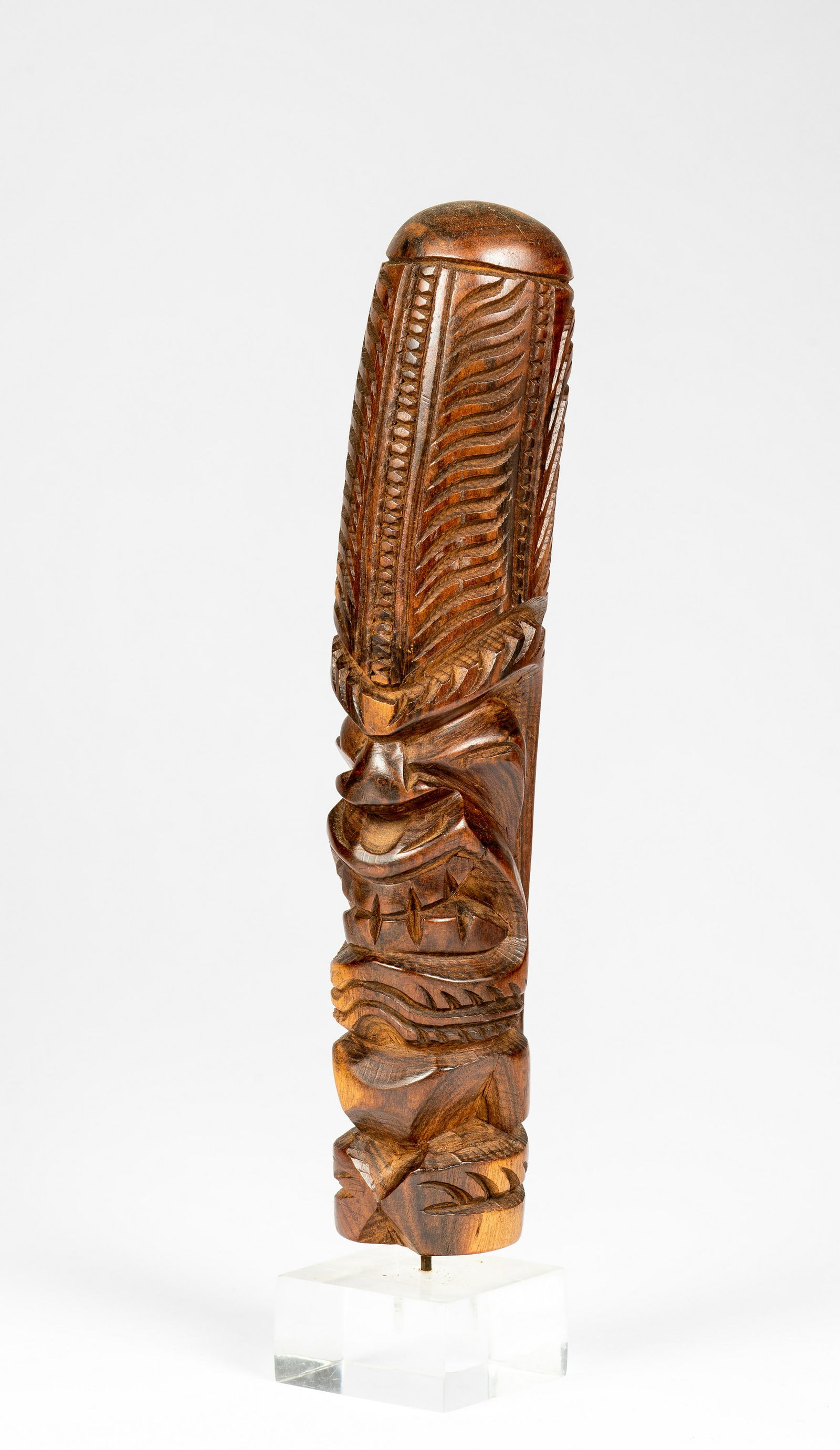 Hawaiian Carved Deity Figurine: Hawaiian Carved Deity Figurine, light wood on a lucite base, height: 10". Provenance: Irv Fischer Collection, Michigan