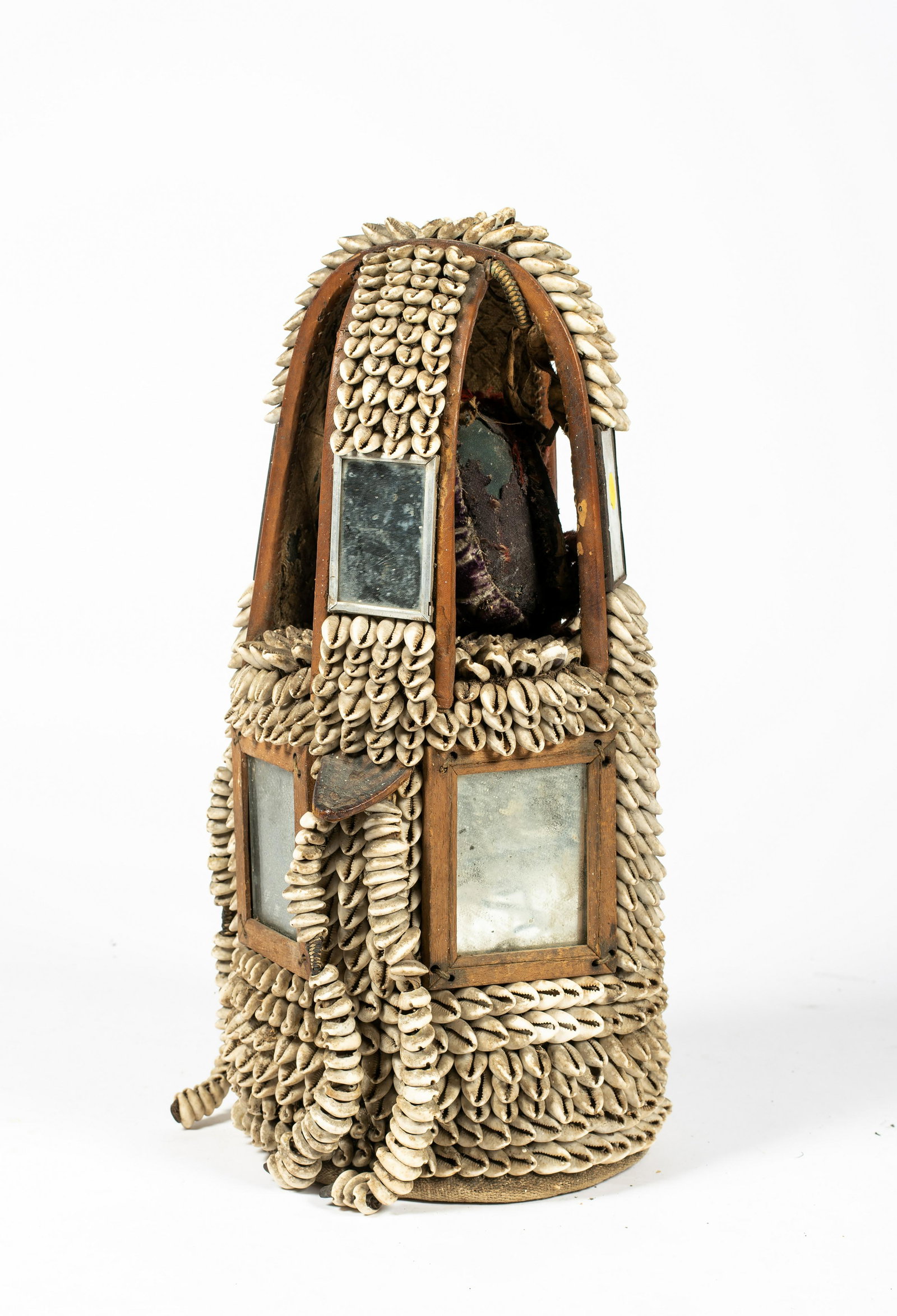 A Yoruba Mirrored Headdress, Nigeria: A Yoruba Mirrored Headdress, Nigeria, height: 19 1/2". Provenance: Acquired in the 1970s by Eva De Ngy Gallery, Provincetown, MA.