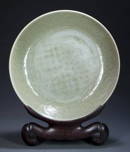 Pre- 1700 Chinese Longquan Celadon Charger.: Chinese Longquan Celadon Stoneware Charger, the interior sides with molded floral & foliate decoration, the bottom with basket weave decoration (warn), at the base a ring left unglazed reveals the ora